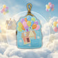 Keychain with house and balloons design on a cloud background