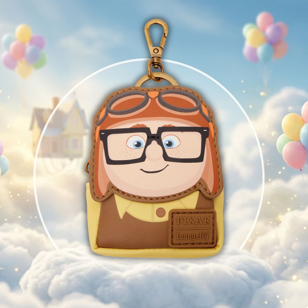 Keychain with cartoon character in a cloud with balloons