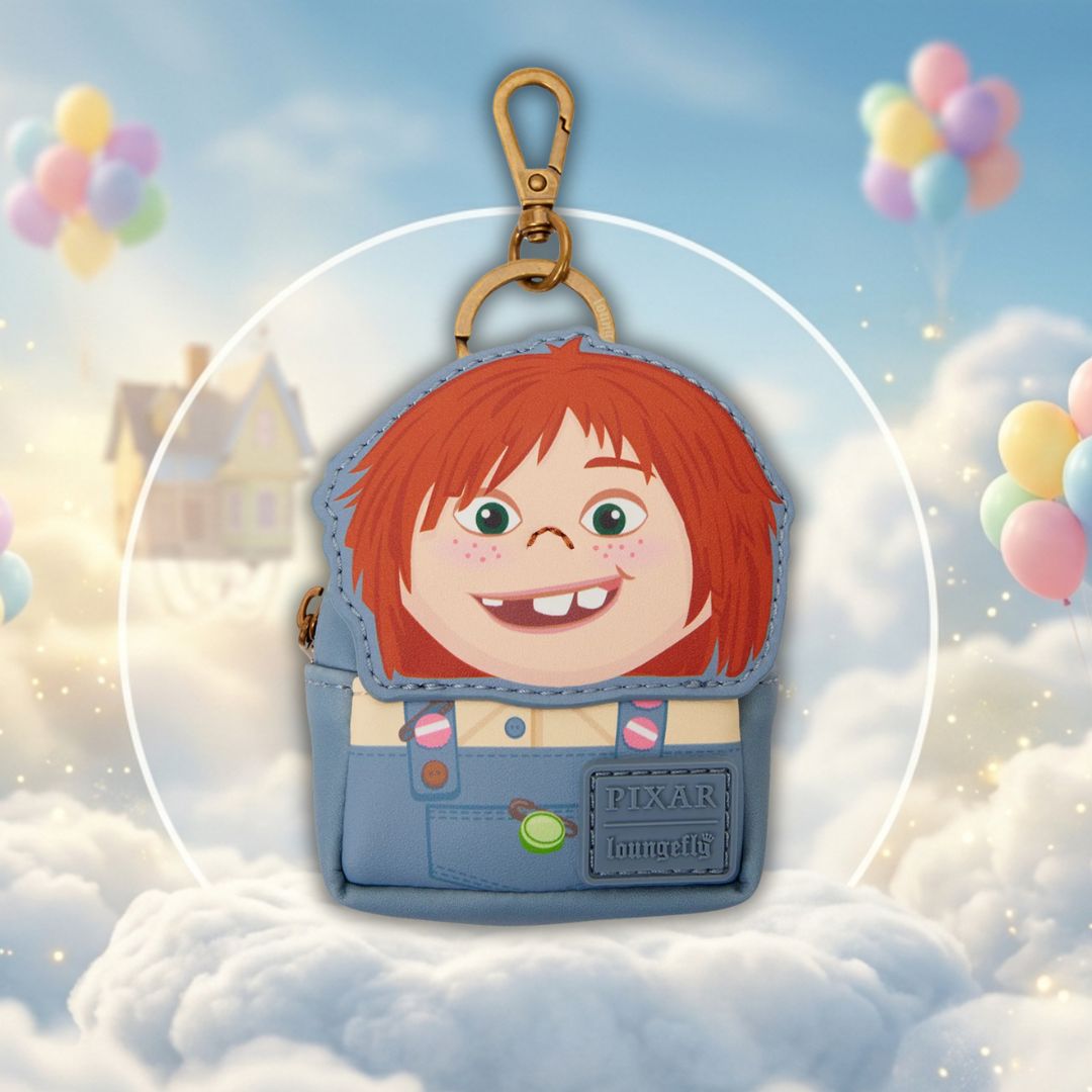 Keychain with cartoon character face on a blue background with balloons