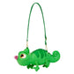 A green chameleon-shaped shoulder bag with a long green strap, gold-tone hardware, and a small pink flower accent on its nose, shown against a plain white background.