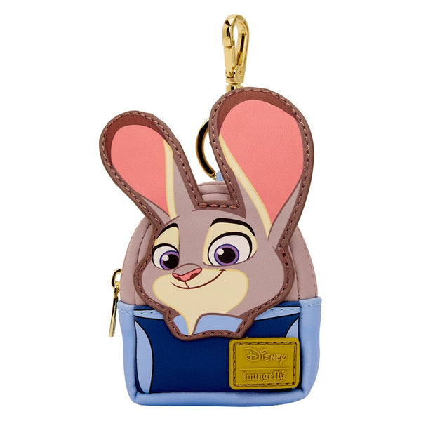 Character keychain with a smiling face, pink ears, and blue outfit on a white background