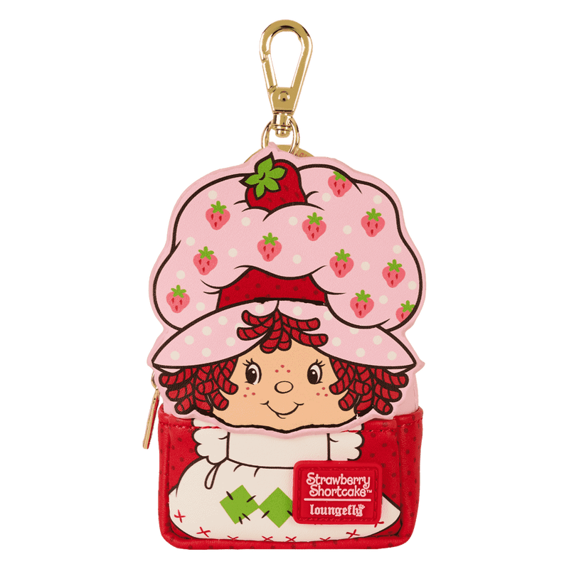 Strawberry Shortcake character keychain with pink hat and red dress on a white background