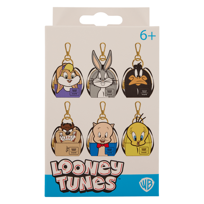 Packaging of Looney Tunes keychains with character illustrations on a beige background.