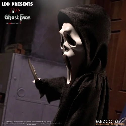 Figure in a dark hood and mask holding a knife, with 'LDD Presents Ghost Face' text and Mezco Toyz branding.
