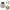 Set of backpack, lunch bag, water bottle, and keychain with anime character design on a white background.