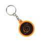 Keychain with orange and black circular design on a white background