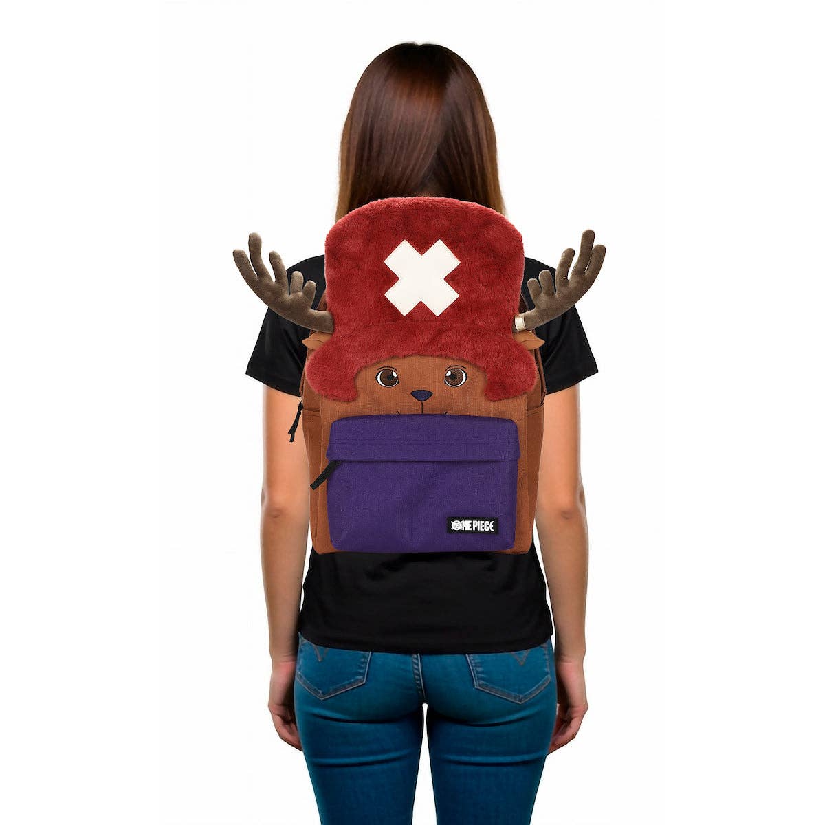 Person wearing a backpack with a cartoon character design on a white background
