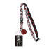 Lanyard with character design and attached badge holder on a white background