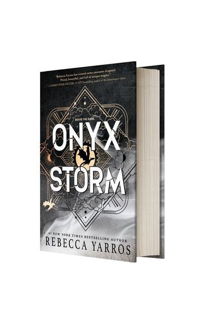Book titled 'Onyx Storm' by Rebecca Yarros on a white background