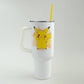 White tumbler with a cartoon character on a white background