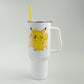 White tumbler with a cartoon character design on a gray background