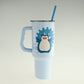 Light blue tumbler with a cartoon character on a white background