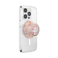 A clear protective phone case on a smartphone, featuring a circular floral pop socket with a Marie Antoinette character design on the top grip.