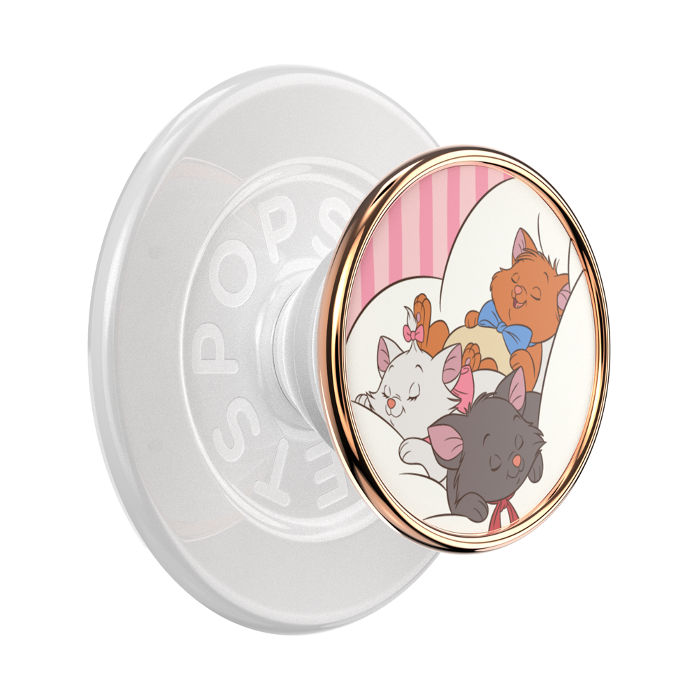 A PopSicle phone grip featuring a circular cartoon illustration of three cats (Marie, Olympe, and Thérèse) on a white and pink striped background, framed by a rose gold metallic border. The back of the grip is translucent white with the brand name 'POPSICLE' embossed.