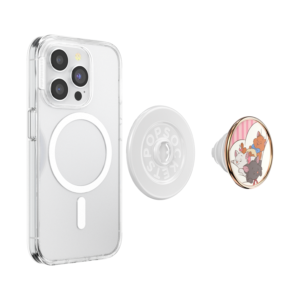 A clear MagSafe-compatible phone case shown on a smartphone, with a separate clear circular magnetic ring insert and a round pop socket featuring a cartoon cat illustration with pink and gold details, all on a white background.