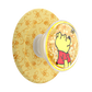 Phone grip with Winnie the Pooh design on a yellow background