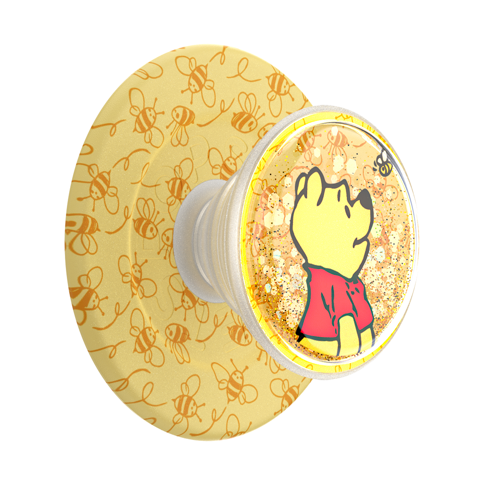 Phone grip with Winnie the Pooh design on a yellow background