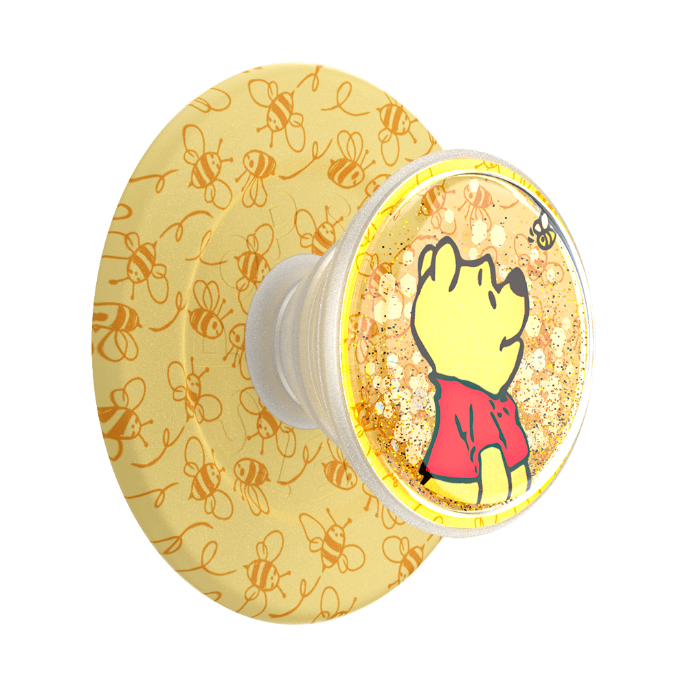 Phone grip with Winnie the Pooh design on a yellow background