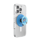 A clear protective phone case on a smartphone, featuring a blue circular pop socket with a cartoon blue creature holding a small red heart under a crescent moon.
