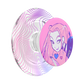 A clear acrylic phone grip with pink and purple wavy line patterns on the underside and a circular pink graphic featuring a stylized anime character on the top.
