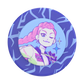 A circular collectible pin badge featuring a stylized anime character with pink hair, set against a blue and purple patterned background.
