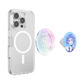 Clear MagSafe phone case shown on a smartphone, with two interchangeable pop-sock style grips displayed beside it: one iridescent pastel pattern and one blue circular grip featuring an anime-style character.