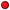 A circular red and black Pop Sockets bottle opener on a solid white background.