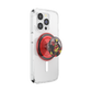 A clear protective phone case on a smartphone, featuring a red and black circular pop socket with a Deadpool character graphic on the end, shown against a plain white background.