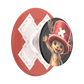 A red and white PopSockets grip stand featuring a cartoon character wearing a red hat with a white cross, shown on a plain white background.