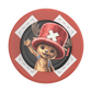 Round red object with a bear wearing a red hat and blue scarf on a white background