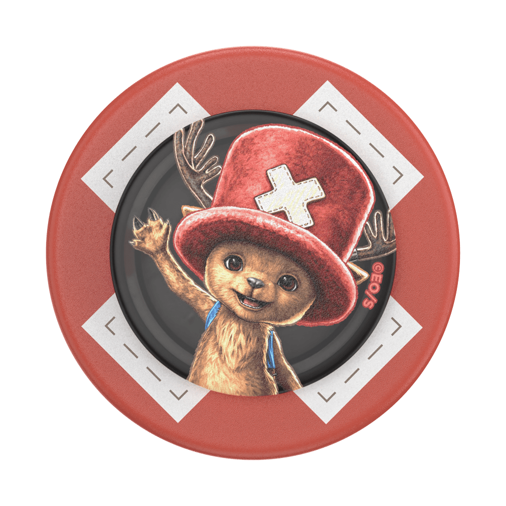 Round red object with a bear wearing a red hat and blue scarf on a white background