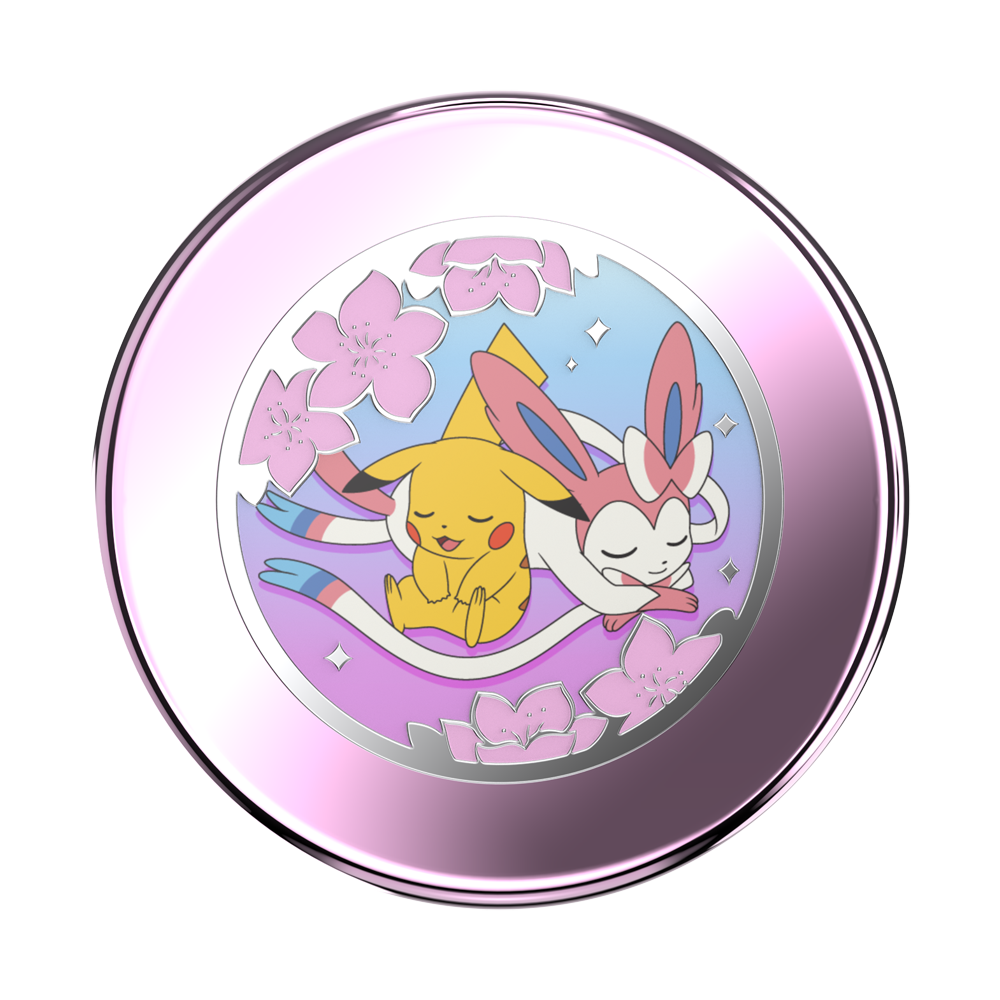 A round metallic compact or case featuring a colorful illustration of Pikachu and Eevee under pink cherry blossoms, shown on a plain white background.