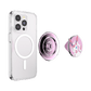 Phone case with a clear design, a pink phone holder, and a unicorn-themed phone holder on a white background.