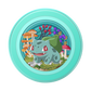 A circular decorative plaque or coaster featuring Bulbasaur from Pokémon, set against a solid white background.