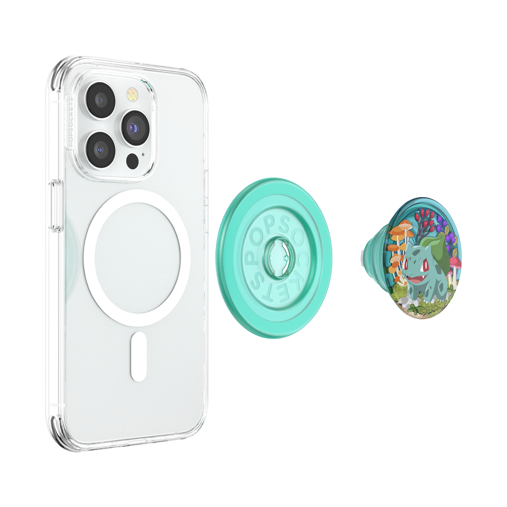 A clear MagSafe-compatible phone case shown on a white phone, alongside a mint green Popsicle Stand and a matching round pop socket with a colorful Bulbasaur illustration, on a clean white background.