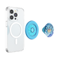 Clear MagSafe phone case shown on a smartphone, with two PopSockets accessories displayed beside it: a blue circular suction cup and a blue character pop socket featuring a cartoon turtle in a wave design.