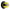 Batman logo on a black and yellow circular design with a metallic rim.