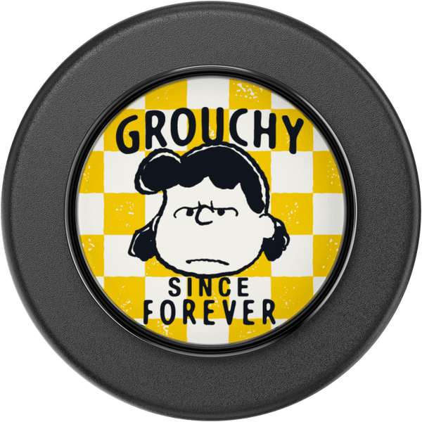 Circular product with a character design and text 'Grouchy Since Forever' on a checkered background.