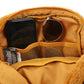 Yellow pouch with phone, sunglasses, and a small item inside