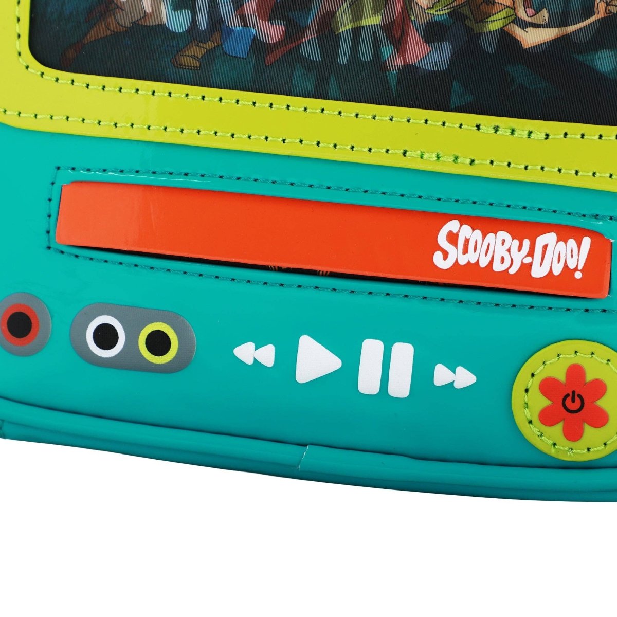 Colorful toy console with 'Scooby-Doo!' branding and control buttons on a white background