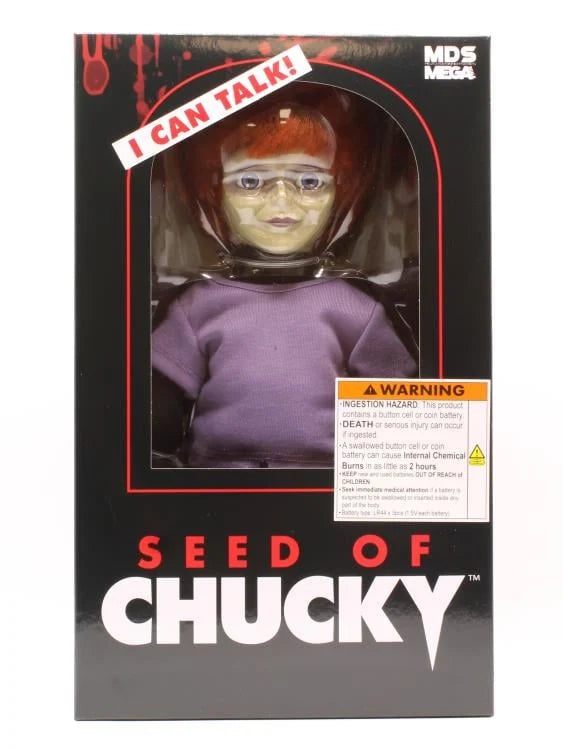 Boxed version of a 'Seed of Chucky' doll with text and warning label.