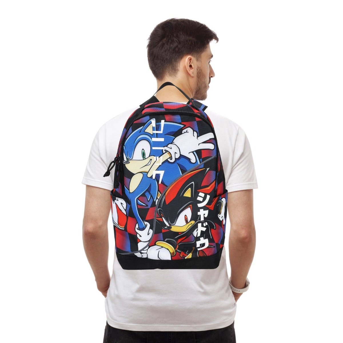 Person wearing a Sonic the Hedgehog backpack on a white background