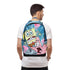 Person wearing a colorful backpack with cartoon characters on a white background