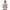 Person wearing a pink and green backpack with a cartoon character design on a white background