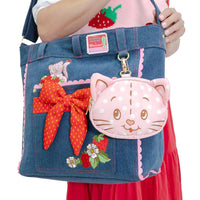 Strawberry Shortcake denim tote bag styled as a collectible accessory inspired by the original artwork