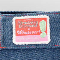 Denim tote bag decorated with Strawberry Shortcake and floral details from the classic Strawberryland design