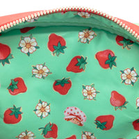 Quilted strawberry crossbody bag with adjustable strap and whimsical printed fabric lining