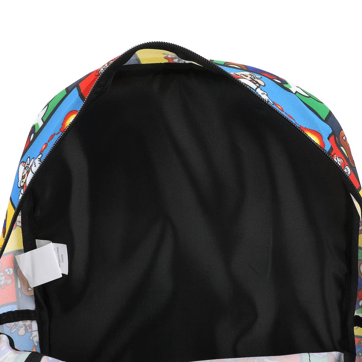 Backpack with colorful cartoon pattern on the outside and black interior.