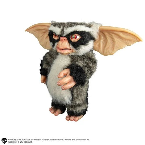 Gremlin plush toy from the movie 'Gremlins' on a white background