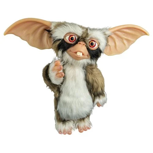 Plush toy resembling a character with large ears and red eyes on a white background
